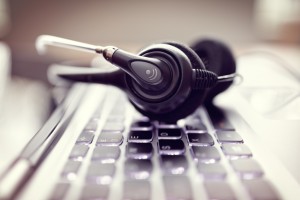 auto attendant VOIP headset on laptop computer keyboard